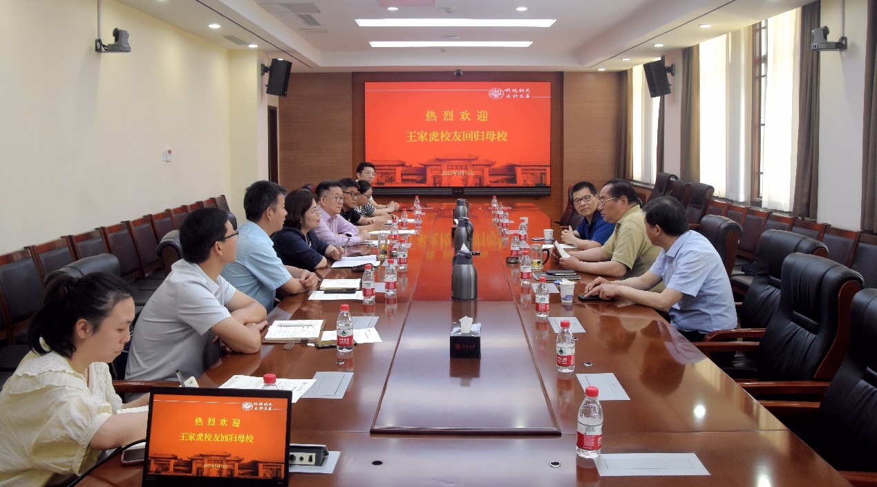 员工王家虎回母校交流访问